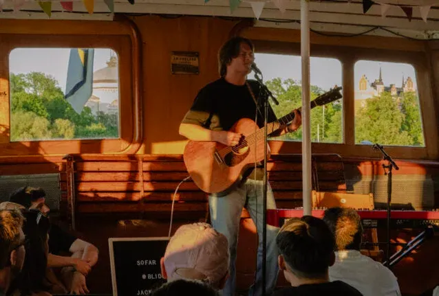 Musician on Archipelago Boat Tour